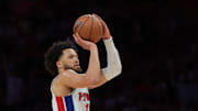 Mar 19, 2025; Miami, Florida, USA; Detroit Pistons guard Cade Cunningham (2) shoots the basketball against the Miami Heat during the fourth quarter at Kaseya Center. Mandatory Credit: Sam Navarro-Imagn Images