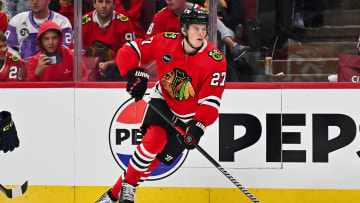 Sep 28, 2023; Chicago, Illinois, USA;  Chicago Blackhawks forward Lukas Reichel (27) skates against the St. Louis Blues at United Center. Mandatory Credit: Jamie Sabau-USA TODAY Sports