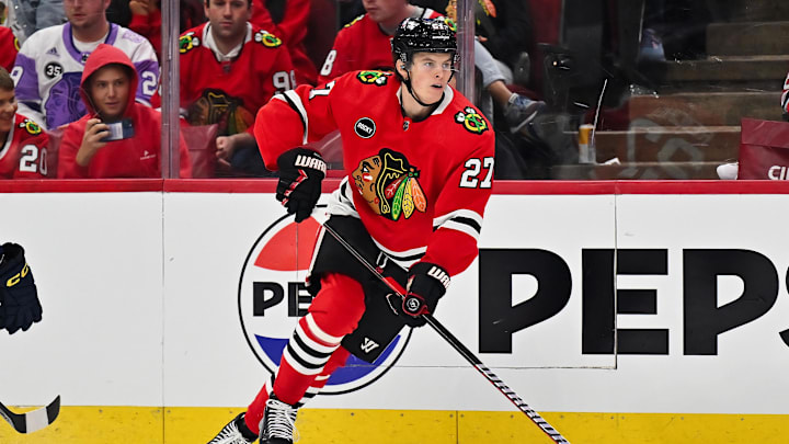 Sep 28, 2023; Chicago, Illinois, USA;  Chicago Blackhawks forward Lukas Reichel (27) skates against the St. Louis Blues at United Center. Mandatory Credit: Jamie Sabau-USA TODAY Sports
