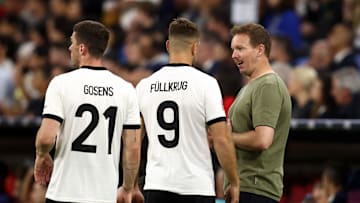 Julian Nagelsmann, Niclas Füllkrug und Robin Gosens an der Seitenlinie im Spiel gegen Portugal