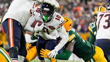 Dec 7, 2025; Green Bay, Wisconsin, USA; Chicago Bears wide receiver Luther Burden III (10) rushes the ball during the fourth quarter against the Green Bay Packers at Lambeau Field. \