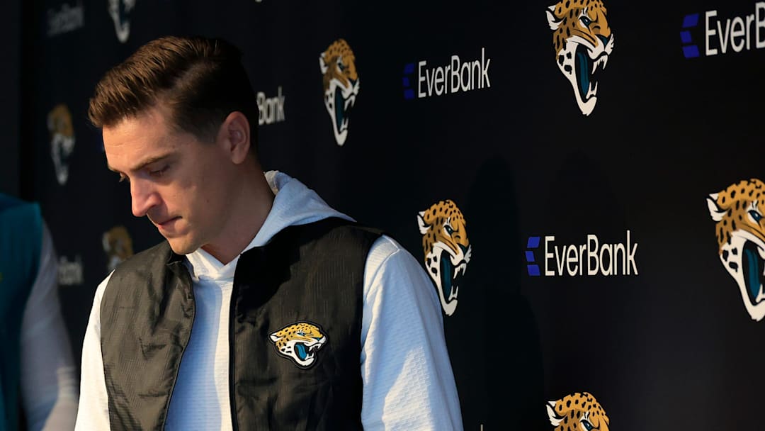 Jacksonville Jaguars general manager James Gladstone walks into the room with head coach Liam Coen following during a press conference at the Miller Electric Center, Wednesday, Jan. 14, 2026, in Jacksonville, Fla.