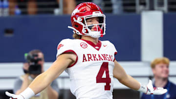 Sep 28, 2024; Arlington, Texas, USA;  Arkansas Razorbacks wide receiver Isaac TeSlaa (4) celebrates after scoring a touchdown during the first quarter against the Texas A&M Aggies at AT&T Stadium. Mandatory Credit: Kevin Jairaj-Imagn Images