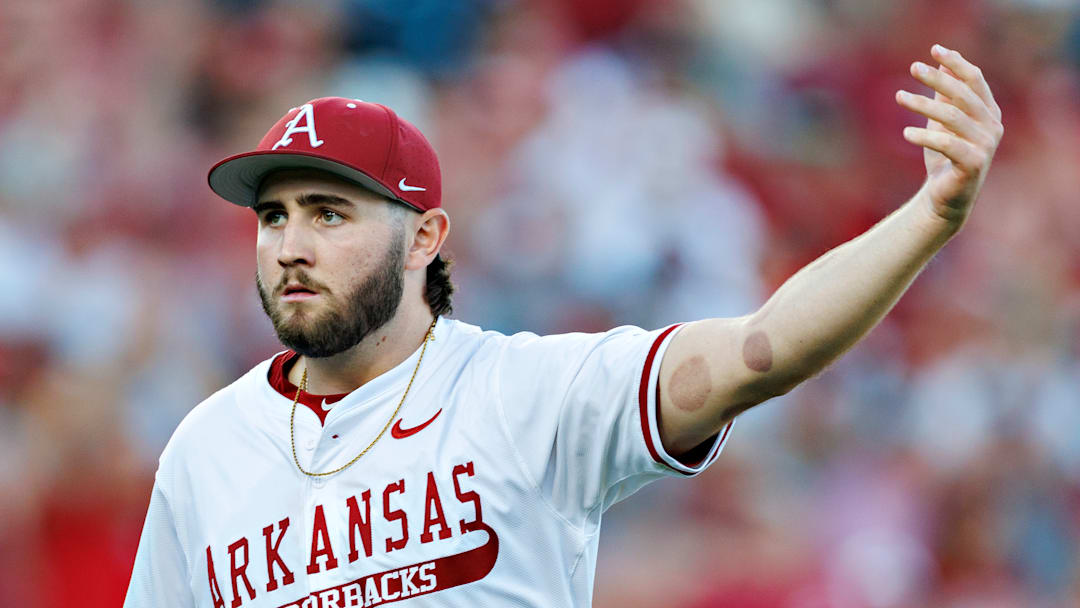 Arkansas Razorback junior left handed pitcher gestures to the crowd after striking out the side in game one of the weekend series against the No. 1 ranked Texas Longhorns at Baum Walker Stadium. 