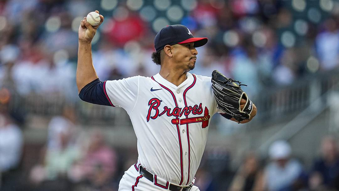 Aug 7, 2025; Cumberland, Georgia, USA; Atlanta Braves starting pitcher Carlos Carrasco (59) pitches against Miami Marlins during the first inning at Truist Park. Mandatory Credit: Dale Zanine-Imagn Images