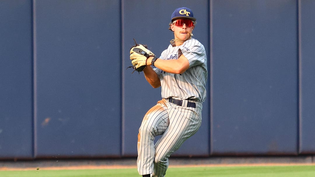 May 31, 2025; Oxford, MS, USA; Georgia Tech Yellowjackets outfielder Drew Burress (8) fields the ball during the first inning against the Murray State Racers. Mandatory Credit: Petre Thomas-Imagn Images