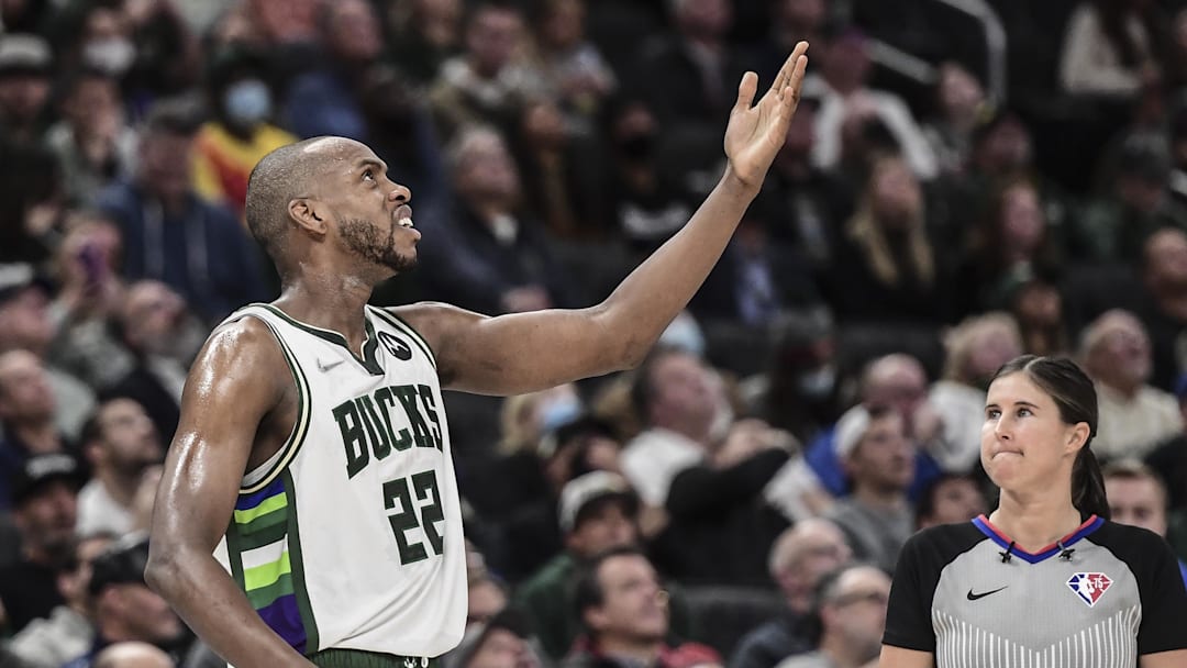 Dec 1, 2021; Milwaukee, Wisconsin, USA; Milwaukee Bucks forward Khris Middleton (22) reacts after a foul call in the second quarter during the game against the Charlotte Hornets at Fiserv Forum. Mandatory Credit: Benny Sieu-Imagn Images