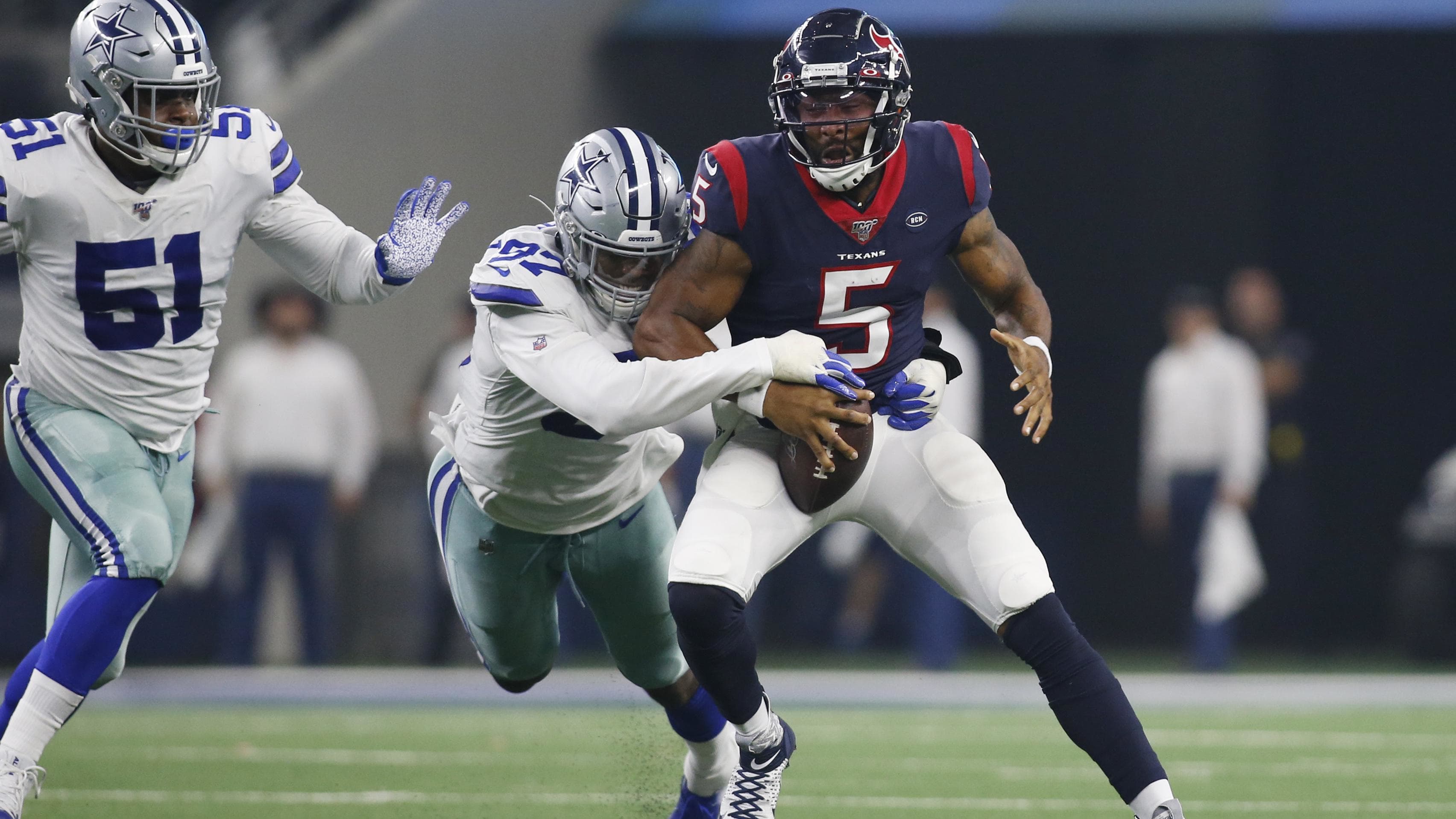 Aug 24, 2019; Arlington, TX, USA; Houston Texans quarterback Joe Webb (5) is sacked by Dallas
