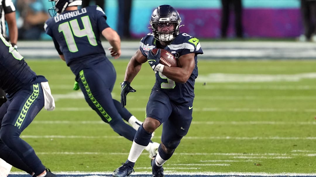 Feb 8, 2026; Santa Clara, CA, USA; Seattle Seahawks running back Kenneth Walker III (9) carries the ball against the New England Patriots during the fourth quarter in Super Bowl LX at Levi's Stadium. Mandatory Credit: Darren Yamashita-Imagn Images
