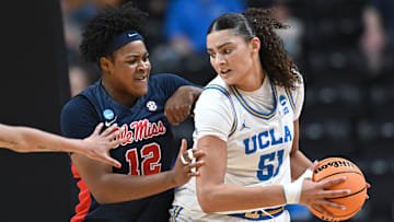 UCLA Bruins center Lauren Betts fights for position against Ole Miss Rebels forward Christeen Iwuala.