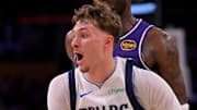 Nov 28, 2025; Los Angeles, California, USA;  Dallas Mavericks forward Cooper Flagg (32) drives to the basket in the second half against the Los Angeles Lakers at Crypto.com Arena. Mandatory Credit: Jayne Kamin-Oncea-Imagn Images