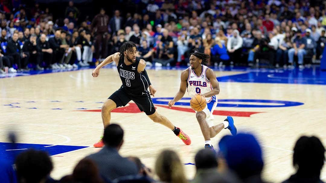 Apr 14, 2024; Sixersers guard Tyrese Maxey drives against Brooklyn Nets forward Trendon Watford during the second quarter at Wells Fargo Center. Mandatory Credit: Bill Streicher-Imagn Images