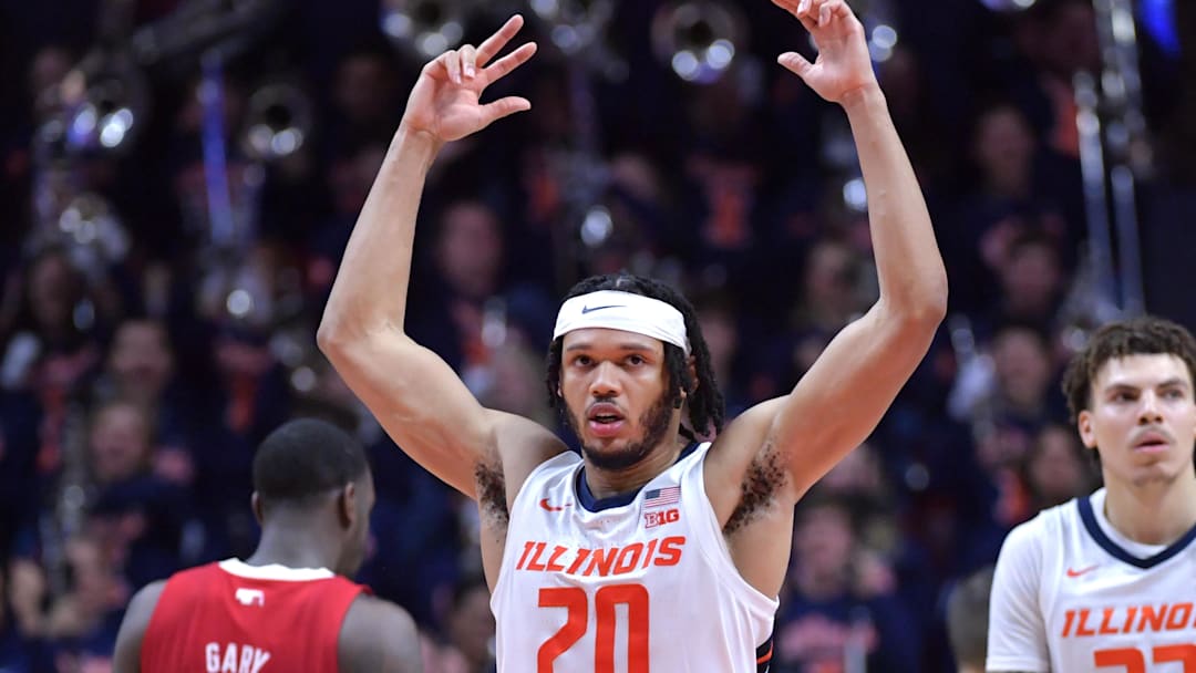 Feb 4, 2024; Champaign, Illinois, USA;  Illinois Fighting Illini forward Ty Rodgers (20) reacts after a 87-84 win over the Nebraska Cornhuskers at State Farm Center. Mandatory Credit: Ron Johnson-Imagn Images