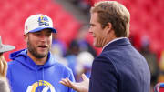 Nov 27, 2022; Kansas City, Missouri, USA; Los Angeles Rams quarterback Matthew Stafford (9), left, talks with sports broadcaster and former NFL tight end Greg Olsen prior to a game at GEHA Field at Arrowhead Stadium. Mandatory Credit: Denny Medley-USA TODAY Sports