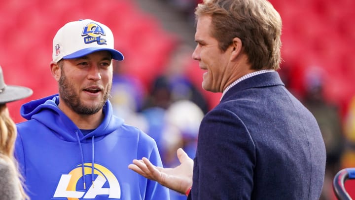 Nov 27, 2022; Kansas City, Missouri, USA; Los Angeles Rams quarterback Matthew Stafford (9), left, talks with sports broadcaster and former NFL tight end Greg Olsen prior to a game at GEHA Field at Arrowhead Stadium. Mandatory Credit: Denny Medley-USA TODAY Sports