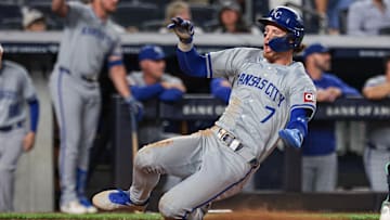 Sep 10, 2024; Bronx, New York, USA; Kansas City Royals shortstop Bobby Witt Jr. (7) scores a run on an RBI single by catcher Salvador Perez (not pictured) during the third inning against the New York Yankees at Yankee Stadium. Mandatory Credit: Vincent Carchietta-Imagn Images