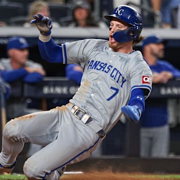 Sep 10, 2024; Bronx, New York, USA; Kansas City Royals shortstop Bobby Witt Jr. (7) scores a run on an RBI single by catcher Salvador Perez (not pictured) during the third inning against the New York Yankees at Yankee Stadium. Mandatory Credit: Vincent Carchietta-Imagn Images