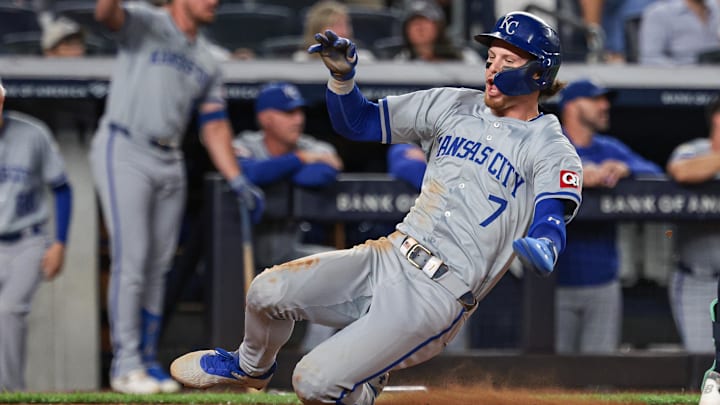 Sep 10, 2024; Bronx, New York, USA; Kansas City Royals shortstop Bobby Witt Jr. (7) scores a run on an RBI single by catcher Salvador Perez (not pictured) during the third inning against the New York Yankees at Yankee Stadium. Mandatory Credit: Vincent Carchietta-Imagn Images