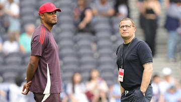 Vincent Kompany mit Max Eberl