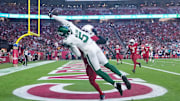 Nov 10, 2024; Glendale, Arizona, USA; New York Jets wide receiver Garrett Wilson (5) cannot make a catch against the Arizona Cardinals during the second half at State Farm Stadium.