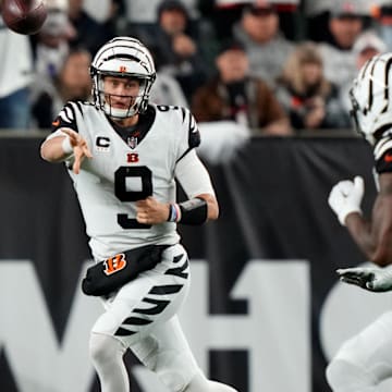 Sep 29, 2022; Cincinnati, Ohio, USA; Cincinnati Bengals quarterback Joe Burrow (9) throws on the run to Cincinnati Bengals wide receiver Tee Higgins (85) in the fourth quarter against the Miami Dolphins at Paycor Stadium in Cincinnati. The Cincinnati Bengals won, 27-15 to improve to 2-2 on the season. Mandatory Credit: Kareem Elgazzar-Imagn Images