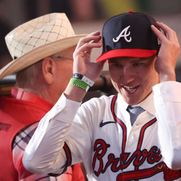 Cam Caminiti reacts after he is drafted by the Atlanta Braves with the 24th pick during the first round of the MLB Draft.