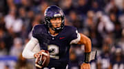 Nov 8, 2025; East Hartford, Connecticut, USA; UConn Huskies quarterback Joe Fagnano (2) runs the ball against the Duke Blue Devils in the second quarter at Pratt & Whitney Stadium at Rentschler Field. Mandatory Credit: David Butler II-Imagn Images