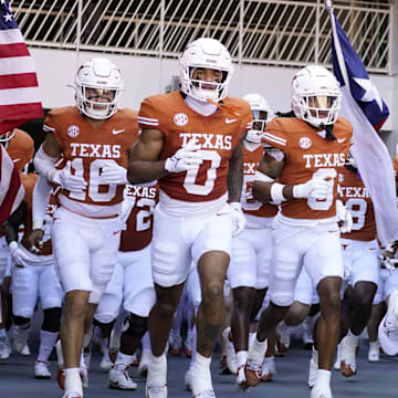 Nov 9, 2024; Austin, Texas, USA; Texas Longhorns head coach Steve Sarkisian leads his team on to the field before a game against the Florida Gators at Darrell K Royal-Texas Memorial Stadium. Mandatory Credit: Scott Wachter-Imagn Images