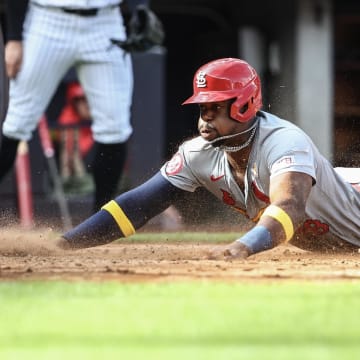 Sep 1, 2024; Bronx, New York, USA;  St. Louis Cardinals right fielder Jordan Walker (18) slides safely into home plate in the seventh inning against the New York Yankees at Yankee Stadium.