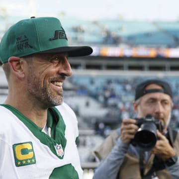 New York Jets quarterback Aaron Rodgers (8) after the game against the Jacksonville Jaguars at EverBank Stadium.