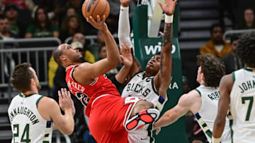 Oct 14, 2024; Milwaukee, Wisconsin, USA; Chicago Bulls guard Talen Horton-Tucker (22) takes a shot against Milwaukee Bucks forward Tyler Smith (21) in the fourth quarter at Fiserv Forum. Mandatory Credit: Benny Sieu-Imagn Images
