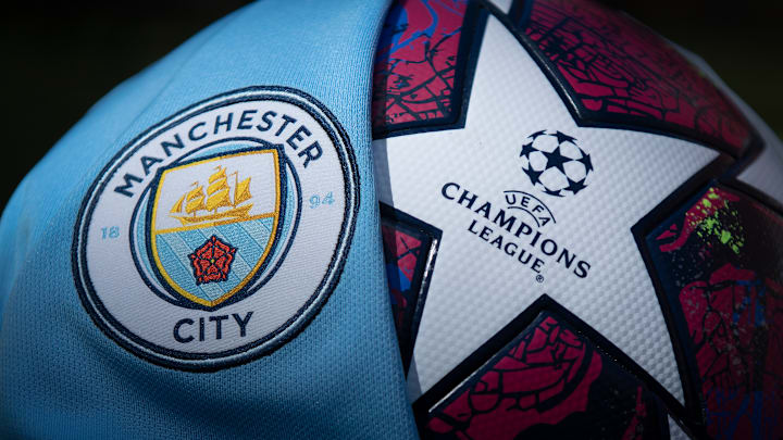 The Manchester City Club Crest with a Premier League Match Ball