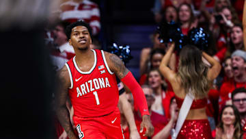 Feb 22, 2025; Tucson, Arizona, USA; Arizona Wildcats guard Caleb Love (1) reacts after dunking the ball during the first half against the BYU Cougars at McKale Center. Mandatory Credit: Aryanna Frank-Imagn Images