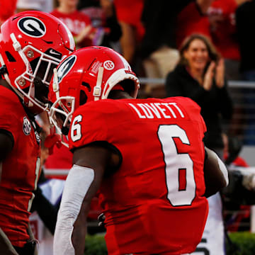 Georgia wide receiver Marcus Rosemy-Jacksaint (1) celebrates with Georgia wide receiver Dominic Lovett (6) after scoring a touchdown during the first half of a NCAA college football game against Kentucky in Athens, Ga., on Saturday, Oct. 7, 2023.