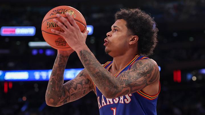 Nov 18, 2025; New York, New York, USA; Kansas Jayhawks guard Jayden Dawson (1) shoots the ball during the first half against the Duke Blue Devils at Madison Square Garden. Mandatory Credit: Vincent Carchietta-Imagn Images