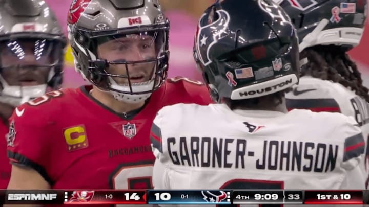 Baker Mayfield exchanging words with C.J. Gardner-Johnson of the Texans