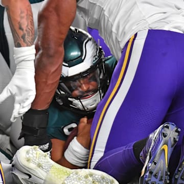 Sep 14, 2023; Philadelphia, Pennsylvania, USA; Philadelphia Eagles quarterback Jalen Hurts (1) scores a touchdown  against the Minnesota Vikings during the second quarter at Lincoln Financial Field. Mandatory Credit: Eric Hartline-Imagn Images