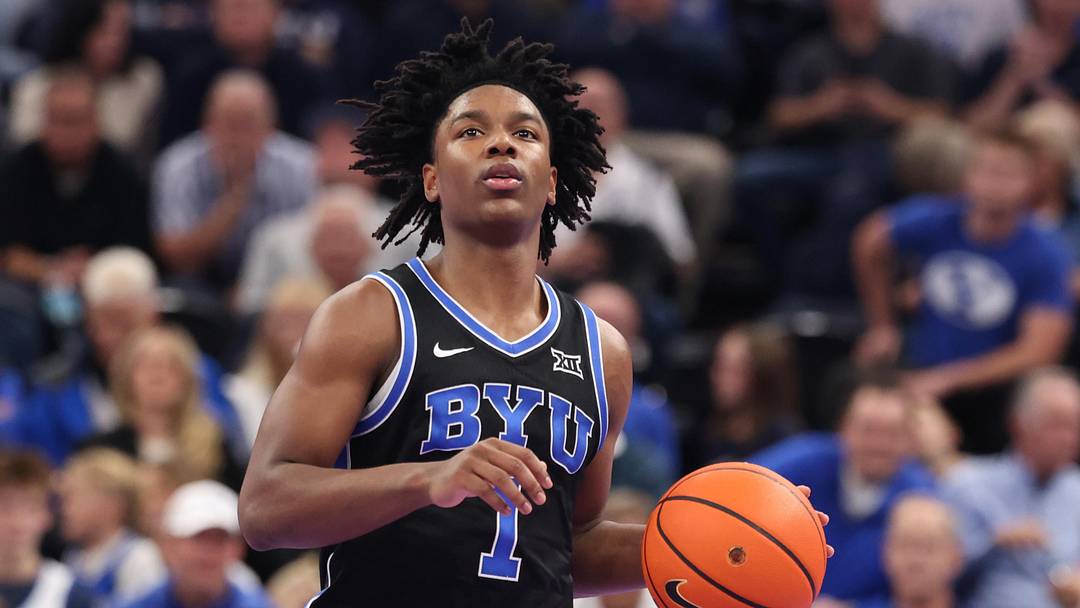 Nov 21, 2025; Salt Lake City, Utah, USA; BYU Cougars guard Robert Wright III (1) brings the ball up the court against the Wisconsin Badgers during the second half at Delta Center. Mandatory Credit: Rob Gray-Imagn Images