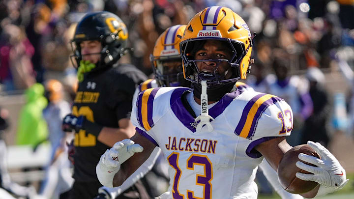 Dec 6, 2024; Birmingham, AL, USA; Jackson's Ezavier Crowell (13) breaks a long touchdown run on the Aggie’s first possession against Cherokee County at Protective Stadium in the AHSAA 4A State Championship game. Dec 6, 2024; Birmingham, AL, USA; Jackson's Ezavier Crowell (13) breaks a long touchdown run on the Aggie’s first possession against Cherokee County at Protective Stadium in the AHSAA 4A State Championship game.