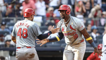 Sep 1, 2024; Bronx, New York, USA;  St. Louis Cardinals right fielder Jordan Walker (18) celebrates with catcher Iván Herrera (48) after scoring in the seventh inning against the New York Yankees at Yankee Stadium. Mandatory Credit: Wendell Cruz-USA TODAY Sports