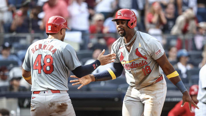 Sep 1, 2024; Bronx, New York, USA;  St. Louis Cardinals right fielder Jordan Walker (18) celebrates with catcher Iván Herrera (48) after scoring in the seventh inning against the New York Yankees at Yankee Stadium. Mandatory Credit: Wendell Cruz-USA TODAY Sports