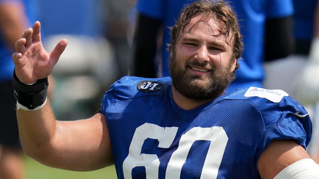 Indianapolis Colts center Tanor Bortolini (60) warms up Thursday, Aug. 14, 2025, at a joint practice with the Green Bay Packers during training camp at Grand Park in Westfield.