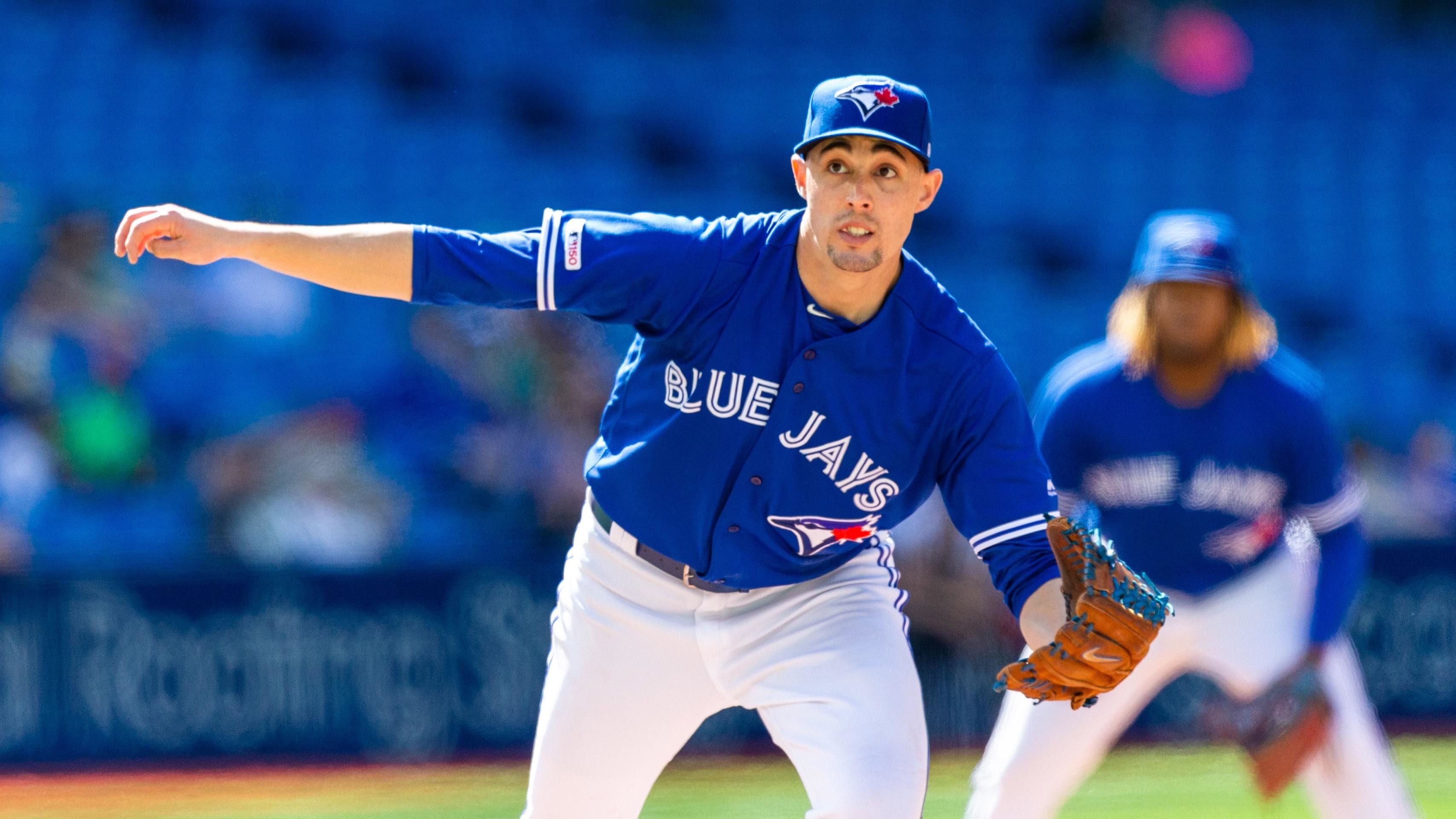 Jun 8, 2019; Toronto, Ontario, CAN; Toronto Blue Jays starting pitcher Aaron Sanchez (41) tracks the ball.