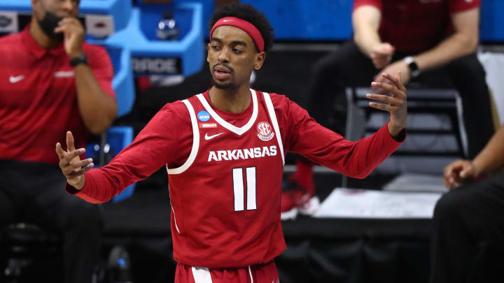 Arkansas Razorbacks guard Jalen Tate reacts during the second half in the Elite Eight of the 2021 NCAA Tournament against the Baylor Bears at Lucas Oil Stadium.