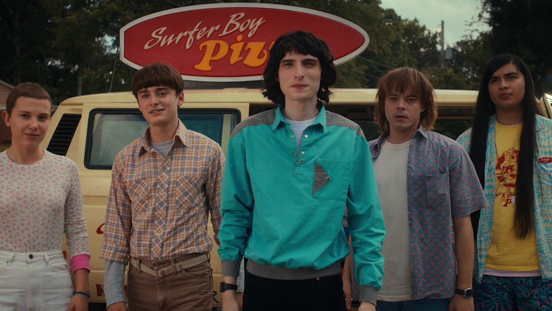 STRANGER THINGS. (L to R) Millie Bobby Brown as Eleven, Noah Schnapp as Will Byers, Finn Wolfhard as Mike Wheeler, Charlie Heaton as Jonathan Byers, and Eduardo Franco as Argyle in STRANGER THINGS. Cr. Courtesy of Netflix © 2022