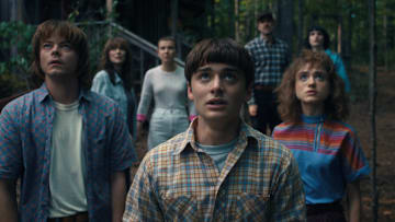 (L to R) Charlie Heaton as Jonathan Byers, Winona Ryder as Joyce Byers, Millie Bobby Brown as Eleven, Noah Schnapp as Will Byers, David Harbour as Jim Hopper, Natalia Dyer as Nancy Wheeler, and Finn Wolfhard as Mike Wheeler in Stranger Things season 4
