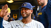 Jul 13, 2025; Milwaukee, Wisconsin, USA;  Milwaukee Brewers starting pitcher Freddy Peralta (51) is greeted in the dugout after pitching six plus innings against the Washington Nationals at American Family Field.