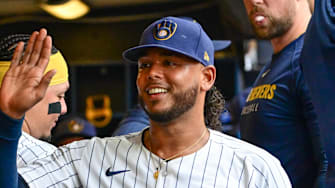 Jul 13, 2025; Milwaukee, Wisconsin, USA;  Milwaukee Brewers starting pitcher Freddy Peralta (51) is greeted in the dugout after pitching six plus innings against the Washington Nationals at American Family Field.