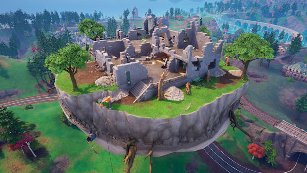 Fortnite screenshot of Doom Island. An island floating in the sky with grassy terrain and a ruined building on top.