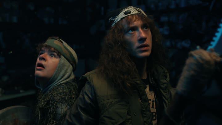 Gaten Matarazzo as Dustin Henderson and Joseph Quinn as Eddie Munson in STRANGER THINGS season 4 on Netflix.